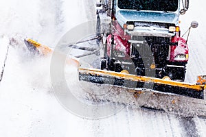 Snowplow removing the Snow from the Highway