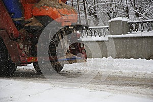 Snowplow removing snow from streets