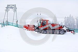 Snowplow working on a ski slope