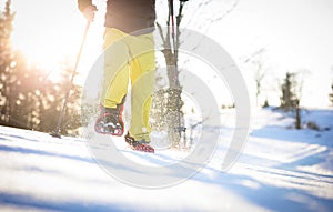 Snowshoeing in winter in deep snow