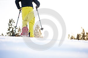 Snowshoeing in winter in deep snow