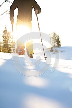 Snowshoeing in winter in deep snow