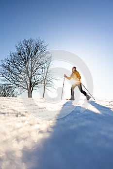 Snowshoeing in winter in deep snow