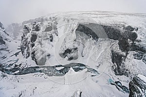 Snowstorm in Fjadrargljufur FjaÃ°rÃ¡rgljÃºfur Canyon in South-Iceland. Winter in Iceland.