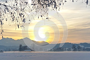 Snowy Alpine Field Sunset