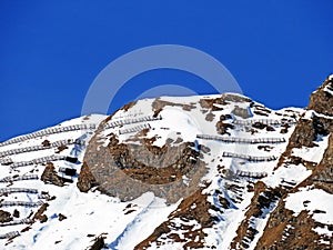 Snowy alpine mountain peak ChÃ¢tillon located in a mountain massif of the Bernese Alps Alpes bernoises, Les Diablerets - Suisse