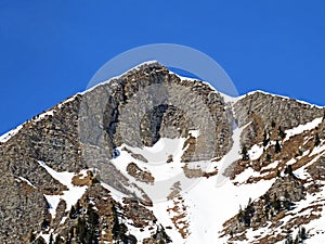 Snowy alpine mountain peak La Palette located in a mountain massif of the Bernese Alps Alpes bernoises, Les Diablerets - photo