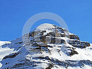 Snowy alpine mountain peak TÃªte Ronde in the mountain massif Les Diablerets Rochers or Scex de Champ, Switzerland / Suisse