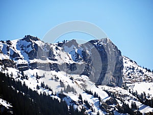 Snowy Alpine peak of Blaue Tosse in the Swiss mountain range of Pilatus and in the Emmental Alps massif, Schwarzenberg LU