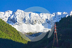 Snowy Alps mountains blue sky view Piedmont Italy