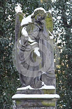 The Snowy Angel in the Graveyard