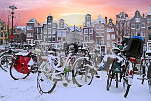 Snowy bikes in Amsterdam the Netherlands