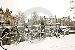 Snowy bikes in Amsterdam the Netherlands