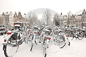 Snowy bikes in Amsterdam the Netherlands