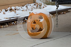 Snowy carved pumpkin