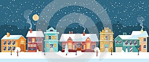 Snowy Christmas night in the cozy town, panorama photo