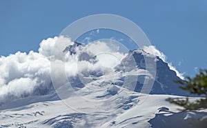 Snowy and cloudy landscape of mountains at Cerro Tronador in Bariloche, Argentina