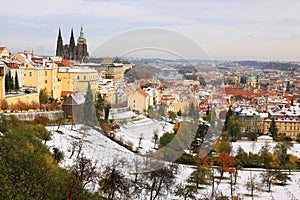 Snowy colorful autumn Prague gothic Castle