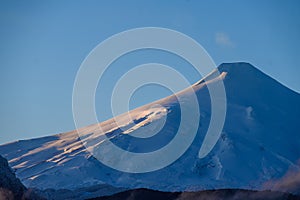 Snowy cone of the Villarrica volcano, Pucón. Chili.