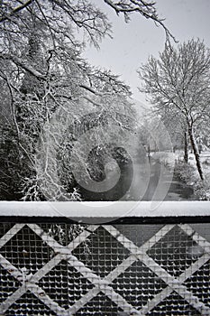 Snowy day in Leamington Spa UK, view over the Leam River, Pump Room Gardens - 10 december 2017