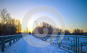 A snowy, frosty winter walking road