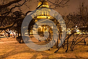 snowy garden near Saint Isaac's Cathedral in night