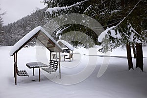 Snowy Gazebos in Winter Mountain Meadow