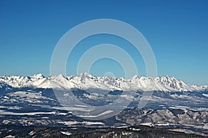 Zasněžené pohoří Vysoké Tatry v zimě, Slovensko