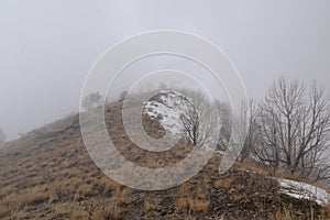 Snowy Hiking Trail views towards Lake Mountains Peak via Israel Canyon road towards Radio Towers in winter, Utah Lake, Wasatch Fro