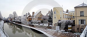 Snowy houses on the towpath of the Briare canal in Montargis