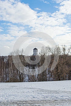 Snowy landscape with christian church