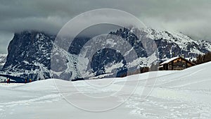 Snowy Landscape with Dolomites and Cabin