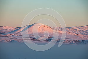 Snowy landscape with mountain