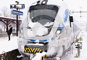 Snowy local train has arrived at its final destination on a winter day