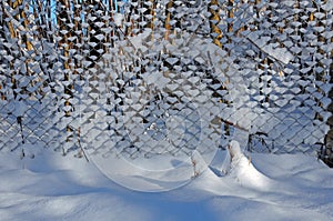 Snowy mesh-fence