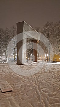 Snowy monument at night