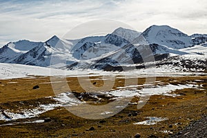 Snowy mountain peaks on the Ala Bel pass, Bishke-Osh highway