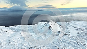 Snowy mountain range, Aerial view nature landscape in Iceland, Snow covered sharp mountain peaks, Icelandic highlands in