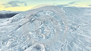 Snowy mountain range, Aerial view nature landscape in Iceland, Snow covered sharp mountain peaks, Icelandic highlands in