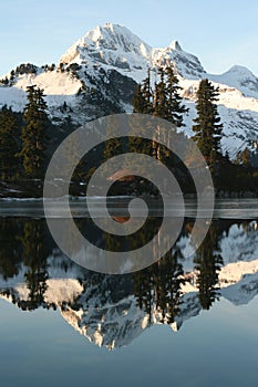 Snowy mountain reflection