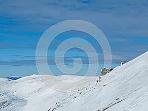 Snowy mountain ridge with rocks in Slovakia