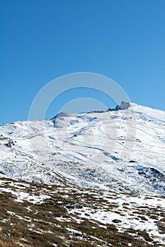 Snowy mountain. Veleta peak in Sierra Nevada. photo