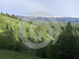 snowy mountains on the background of a valley