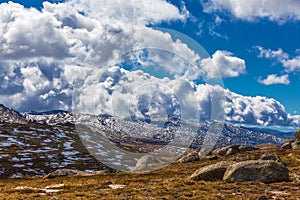 Snowy Mountains and fluffy clouds beautiful landscape. Australia