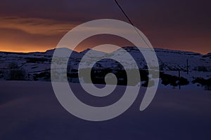 Snowy mountains at night