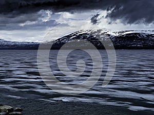 Snowy mountains and sea