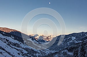 Snowy mountains sunset landscape mountainscape moonrise moon valley view