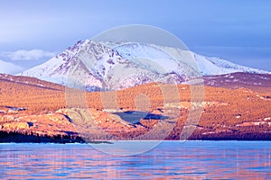 Snowy Mt Laurier frozen Lake Laberge Yukon Canada