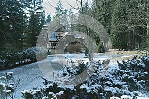 Snowy old medieval house