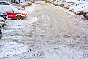 Snowy parking for cars in winter time